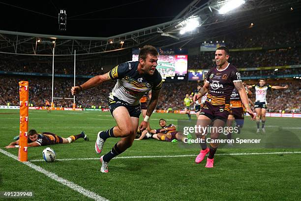 Kyle Feldt of the Cowboys scores a try during the 2015 NRL Grand Final match between the Brisbane Broncos and the North Queensland Cowboys at ANZ...