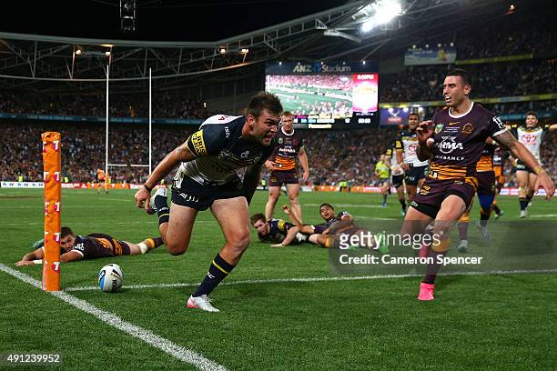 Kyle Feldt of the Cowboys scores a try during the 2015 NRL Grand Final match between the Brisbane Broncos and the North Queensland Cowboys at ANZ...