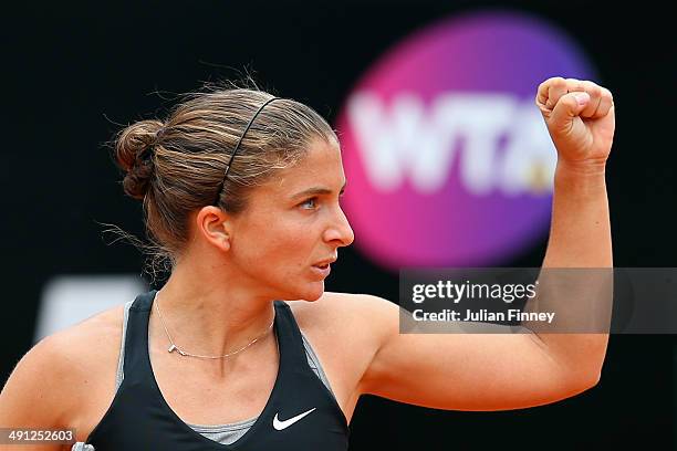 Sara Errani of Italy celebrates winning the first set in her match against Li Na of China during day six of the Internazionali BNL d'Italia tennis...
