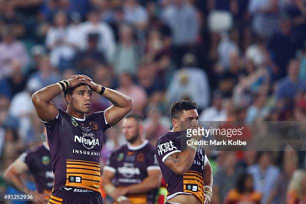Joe Ofahengaue and Jordan Kahu of the Broncos look dejected after defeat during the 2015 NRL Grand Final match between the Brisbane Broncos and the...