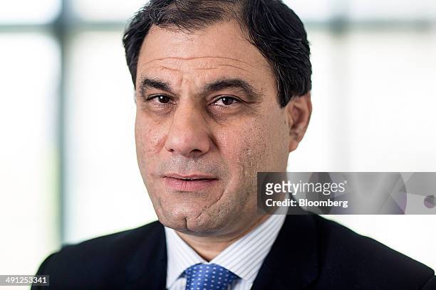 Karan Bilimoria, founder and chairman of Cobra Beer Ltd., poses for a photograph following a Bloomberg Television interview in London, U.K., on...