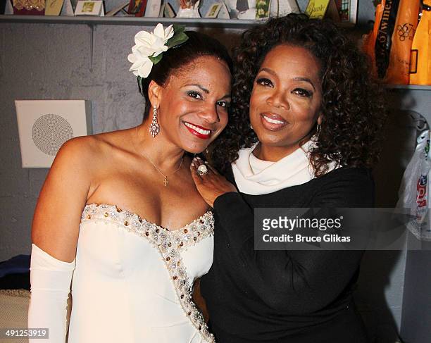 Audra McDonald as "Billie Hollday" and Oprah Winfrey pose backstage at "Lady Day at Emerson's Bar and Grill" on Broadway at The Circle in The Square...