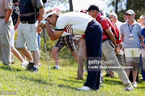Joost Luiten of The Netherlands reacts after he hits his second shot on the 4th hole during Day 2 of the Open de Espana held at PGA Catalunya Resort...