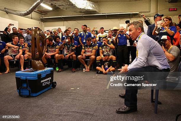 Cowboys coach Paul Green talks to his players in the Cowboys changeroom after winning the 2015 NRL Grand Final match between the Brisbane Broncos and...