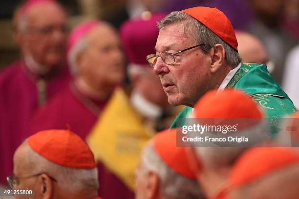 Australian cardinal George Pell attends a mass for the opening of the Synod on the themes of family held by Pope Francis at St. Peter's Basilica on...