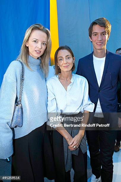 Fashion Designer Phoebe Philo standing between Alexandre Arnault and his sister, Louis Vuitton's executive vice president, Delphine Arnault pose...