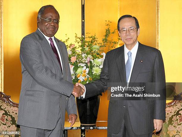 Namibia President Hifikepunye Pohamba and Japanese Prime Minister Yasuo Fukuda shake hands during their meeting on the sidelines of the Tokyo...