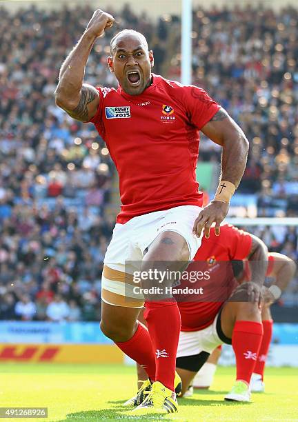 In this handout photograph provided by World Rugby via Getty Images, a member of the Tonga team performs the Sipi Tau during the 2015 Rugby World Cup...