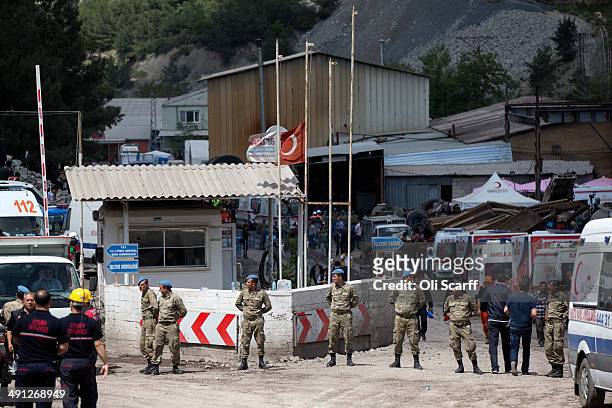 The Turkish national flag flies at half-mast near the entrance to the mine in Soma which collapsed on Tuesday killing at least 284 people on May 16,...