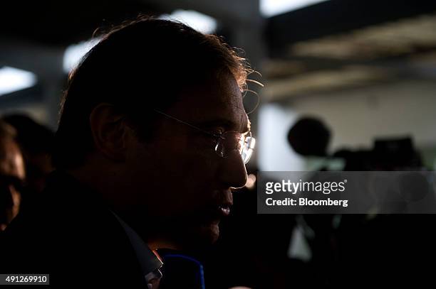 Pedro Passos Coelho, Portugals Prime Minister and leader of the Social Democratic Party , speaks to the media after casting his ballot at a polling...