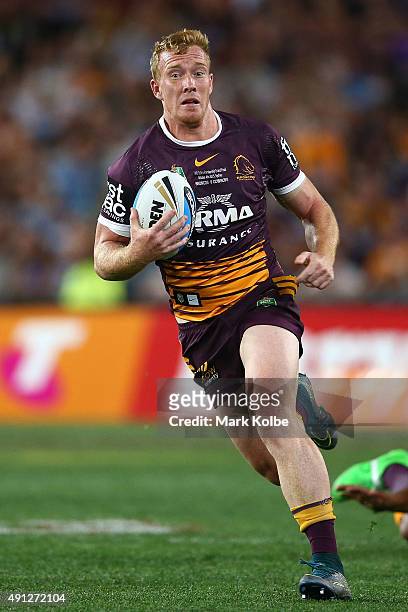 Jack Reed of the Broncos makes a break during the 2015 NRL Grand Final match between the Brisbane Broncos and the North Queensland Cowboys at ANZ...