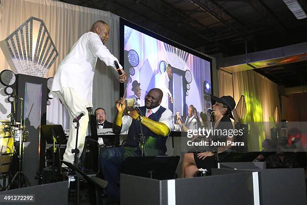 Wyclef Jean, Shaquille O'Neal and Laticia Rolle onstage at Barry University's 75th Anniversary Birthday Bash at Soho Studios on October 3, 2015 in...