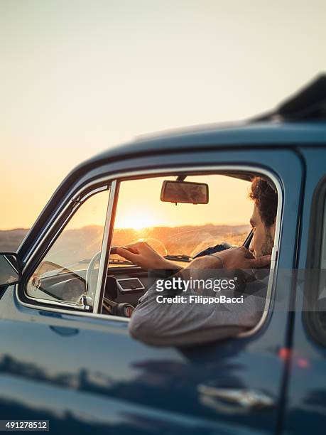 young adult man trip with vintage car - driving italy stock pictures, royalty-free photos & images