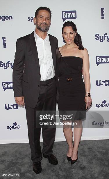 Actors Billy Campbell and Kyra Zagorsky from "Helix" attend the 2014 NBCUniversal Cable Entertainment Upfronts at The Jacob K. Javits Convention...