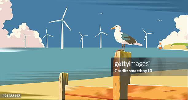 wind farm auf die küste - windkraftanlage stock-grafiken, -clipart, -cartoons und -symbole