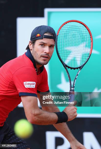 Tommy Haas of Germany plays a backhand in his match against Grigor Dimitrov of Bulgaria during day six of the Internazionali BNL d'Italia tennis 2014...