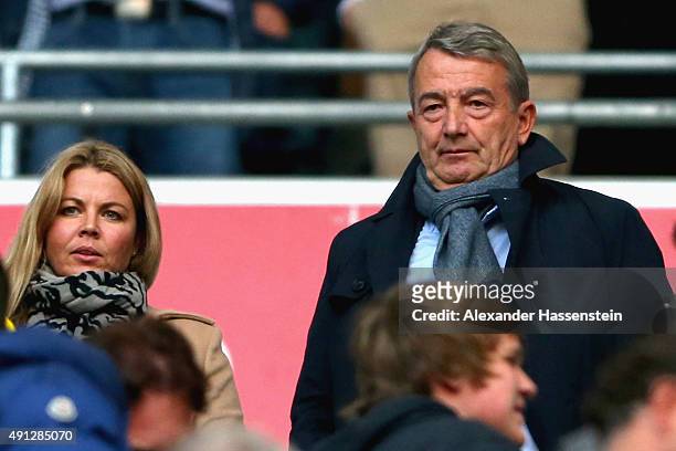 Wolfgang Niersbach, President of the German National Football Association looks on with Marion Popp prior to the Bundesliga match between FC Bayern...