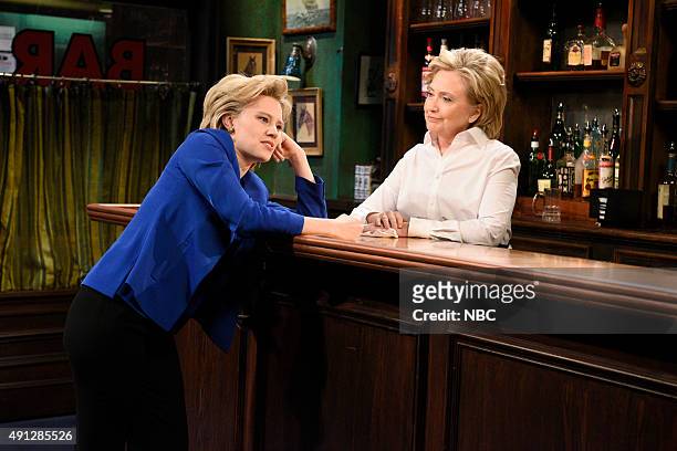 Miley Cyrus" Episode 1684 -- Pictured: Kate McKinnon as Hillary Clinton and Hillary Clinton as Val during the "Bar Talk" sketch on October 3, 2015 --