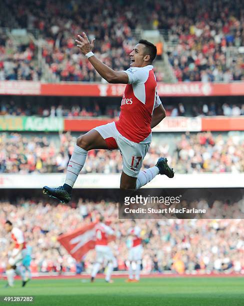 Alexis Sanchez celebrates scoring the 1st Arsenal goal during the Barclays Premier League match between Arsenal and Manchester United at Emirates...