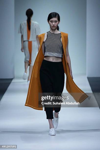 Model showcases design by Ksanyusun during Audi Star Creation 2013 Capsule Collection during the Audi Fashion Festival on day three at Tent at...