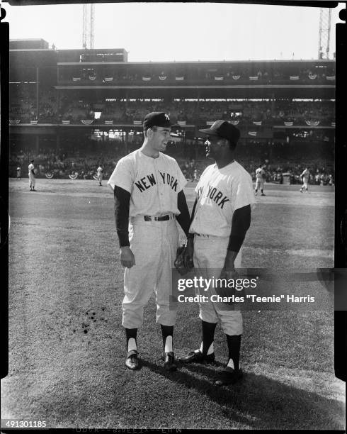 New York Yankees baseball players Ralph Terry and Hector Lopez on field at opening game of 1960 World Series, Forbes Field, Pittsburgh, Pennsylvania,...