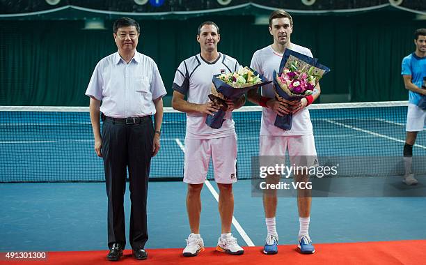 Colin Fleming of Britain and Jonathan Erlich of Israel celebrate after beating Chris Guccione of Australia and Andre Sa of Brazil during the men's...