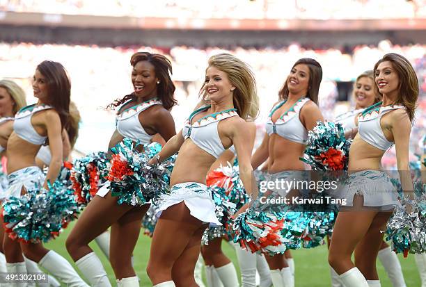 The Miami Dolphin Cheerleaders dance at the NFL International fixture as the New York Jets compete against the Miami Dolphins at Wembley Stadium on...