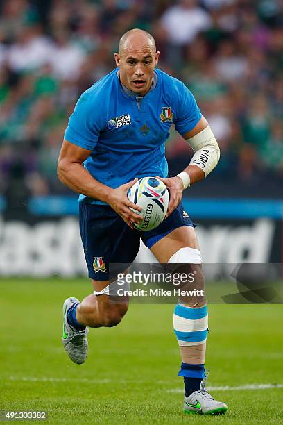 Sergio Parisse of Italy runs with the ball during the 2015 Rugby World Cup Pool D match between Ireland and Italy at the Olympic Stadium on October...