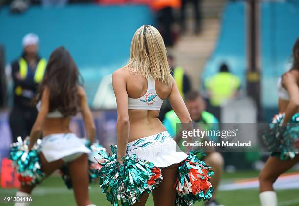 Miami dolphins cheerleaders performs at the annual NFL International fixture as the New York Jets compete against the Miami Dolphins at Wembley...