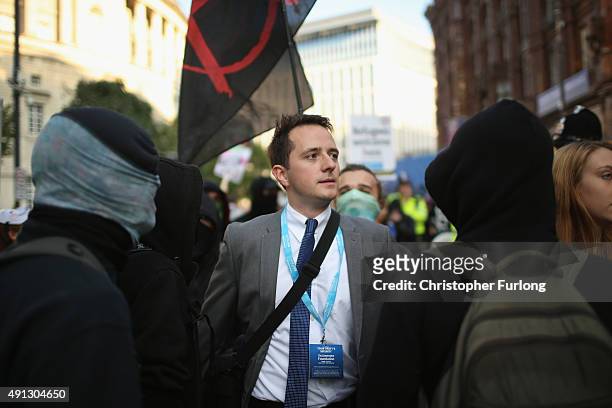 Anarchist protesters confront a delegate attending the first day of the Conservative Party Autumn Conference 2015 on October 4, 2015 in Manchester,...