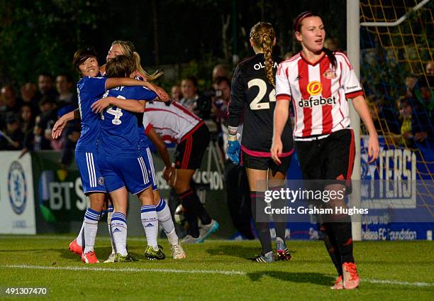 Fran Kirby celebrates after scoring Chelsea's second goal with team mates Ji So Yun and Gemma Davison during the FA WSL match between Chelsea Ladies...