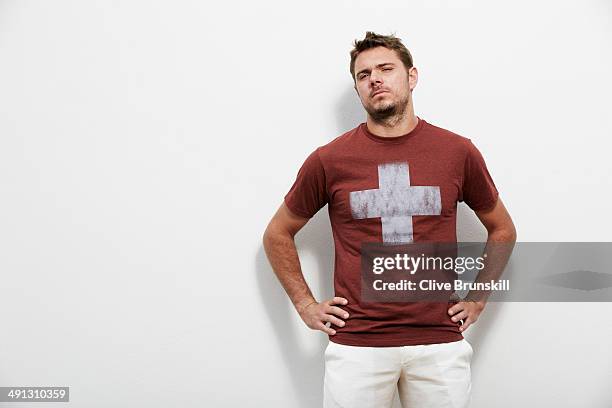 Tennis player Stanislas Wawrinka is photographed at the Eden Roc hotel on March 18, 2014 in Miami, Florida. All clothing and accessories by Giorgio...