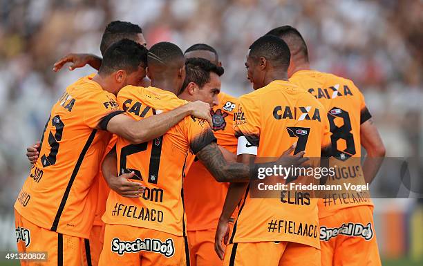 Jadson of Corinthians celebrates scoring the first goal with his team during the match between Ponte Preta and Corinthians for the Brazilian Series A...