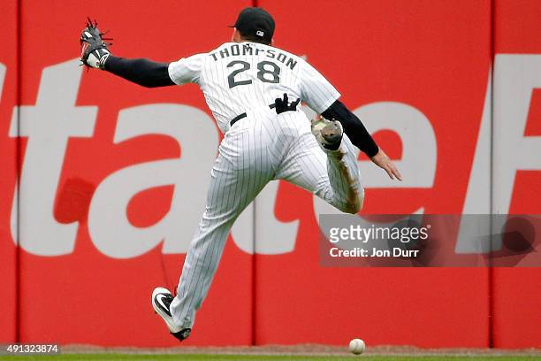 Trayce Thompson of the Chicago White Sox is unable to make a catch against the Detroit Tigers during the fifth inning at U.S. Cellular Field on...