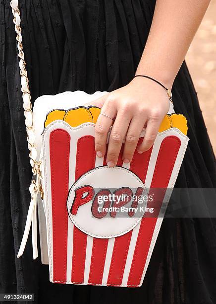 Actress Cami Raich, purse detail, attends the Premiere Of Sony Entertainment's 'Goosebumps' at the Regency Village Theater on October 4, 2015 in...