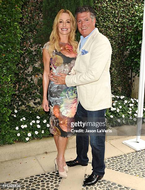 Taylor Armstrong and husband John Bluher attend the Rape Foundation's annual brunch at Greenacres, The Private Estate of Ron Burkle on October 4,...