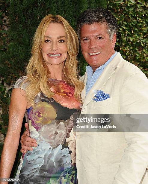 Taylor Armstrong and husband John Bluher attend the Rape Foundation's annual brunch at Greenacres, The Private Estate of Ron Burkle on October 4,...