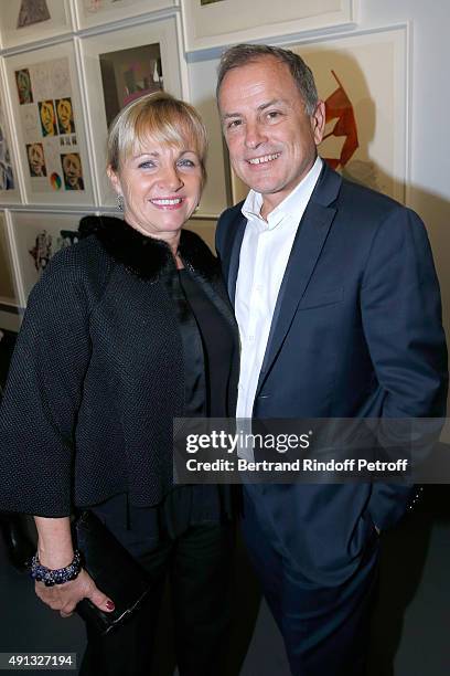 Chairman and Chief Executive Officer of Louis Vuitton, Michael Burke and his wife Brigitte attend the 'Picasso Mania' : Press Preview. Held at Grand...