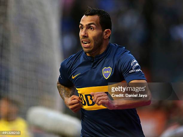 Carlos Tevez of Boca Juniors celebrates after forcing an own goal by Gabriel Tomassini of Crucero del Norte during a match between Boca Juniors and...