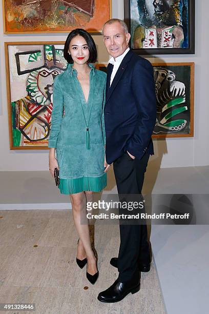 Jiajia Du and Fashion Designer Jean-Claude Jitrois attend the 'Picasso Mania' : Press Preview. Held at Grand Palais on October 4, 2015 in Paris,...