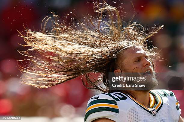 Inside linebacker Clay Matthews of the Green Bay Packers whips his hair during their NFL game against the San Francisco 49ers at Levi's Stadium on...