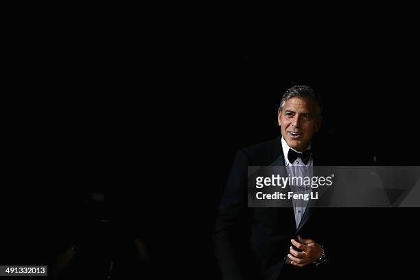 Actor George Clooney arrives for the red carpet of Omega Le Jardin Secret dinner party on May 16, 2014 in Shanghai, China.