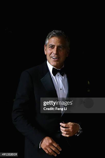 Actor George Clooney arrives for the red carpet of Omega Le Jardin Secret dinner party on May 16, 2014 in Shanghai, China.