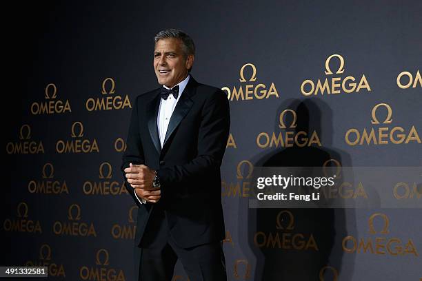 Actor George Clooney arrives for the red carpet of Omega Le Jardin Secret dinner party on May 16, 2014 in Shanghai, China.