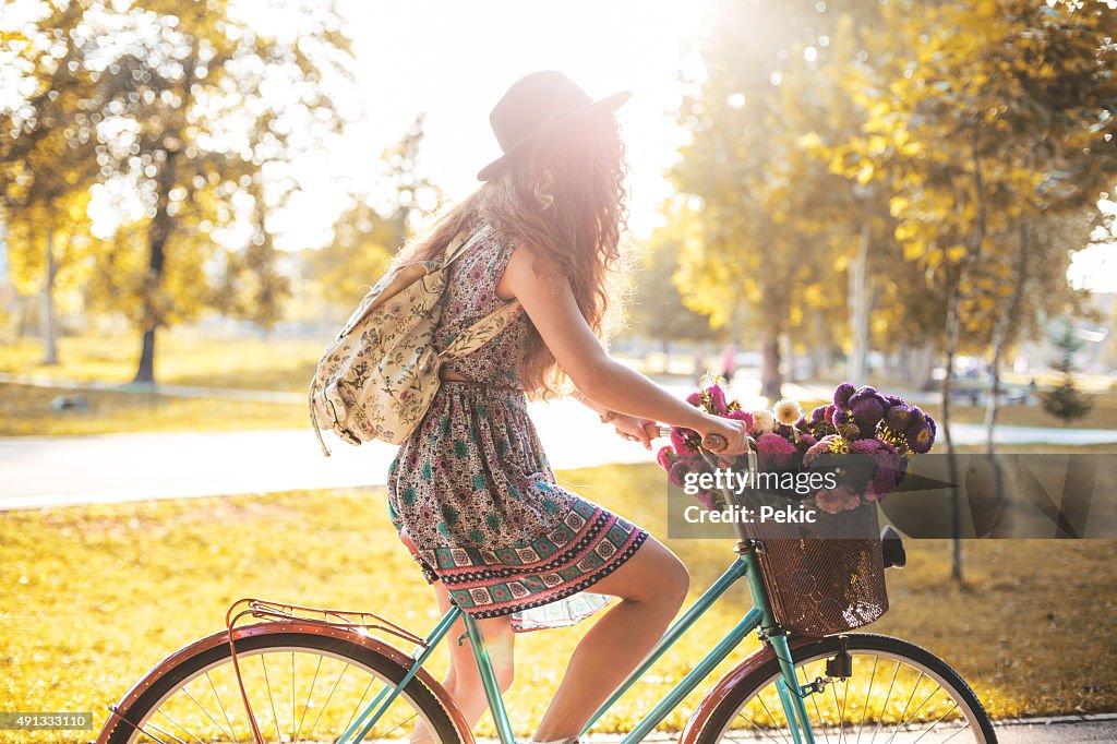 Lady Riding Her Hipster Retro Bike In Vintage Style High-Res Stock