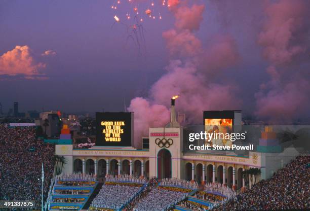 View of the Los Angeles Memorial Coliseum during the closing ceremony of the 1984 Summer Olympics, Los Angeles, 12th August 1984. The scoreboard has...
