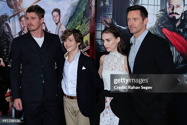 Garrett Hedlund, Levi Miller, Rooney Mara and Hugh Jackman attend 'Pan' premiere at Ziegfeld Theater on October 4, 2015 in New York City.