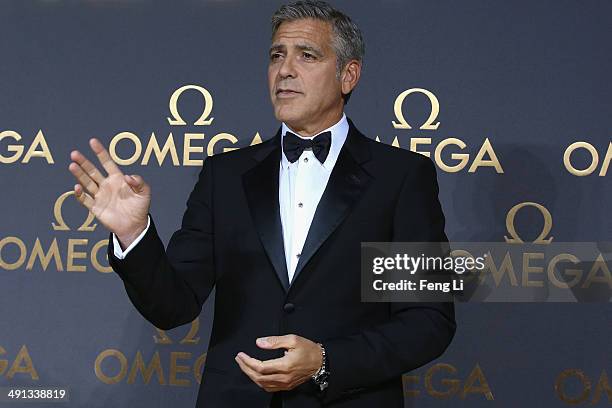 Actor George Clooney arrives for the red carpet of Omega Le Jardin Secret dinner party on May 16, 2014 in Shanghai, China.