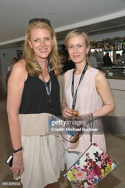 Lisa Gregg and Helena Fisher attend Deadline's Cocktails on the Croisette in partnership with AmericanExpress and Film Fraternity at La Gold Plage on...