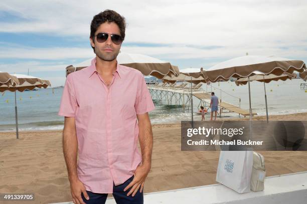 Adrian Grenier attends Deadline's Cocktails on the Croisette in partnership with AmericanExpress and Film Fraternity at La Gold Plage on May 16, 2014...